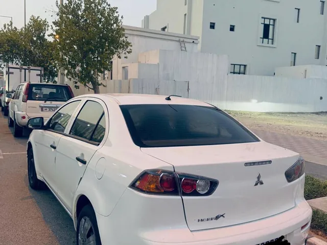 صورة 2013 ميتسوبيشي لانسر EX